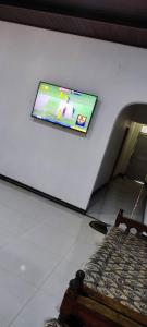 TV a/nebo společenská místnost v ubytování Sunset Villa