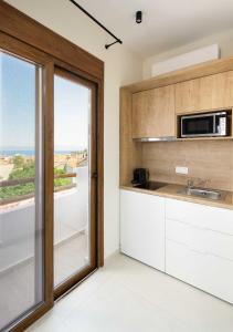Kjøkken eller kjøkkenkrok på Palm Residences