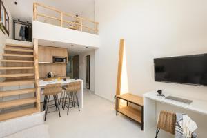 En TV eller et underholdningssystem på Palm Residences