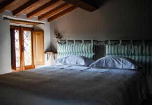Katil atau katil-katil dalam bilik di Agriturismo Cardella