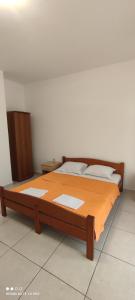 Ένα ή περισσότερα κρεβάτια σε δωμάτιο στο Becici rooms