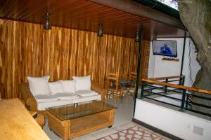 a living room with a couch and a table at Choice Guest House 2 in Addis Ababa