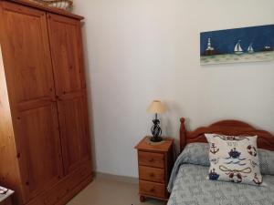 Posteľ alebo postele v izbe v ubytovaní CASA GONDAR