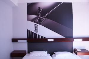 Postel nebo postele na pokoji v ubytování Hotel do Carmo