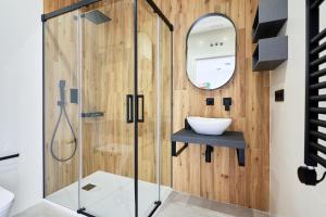 Vonios kambarys apgyvendinimo įstaigoje 9 NIDOS Céntrica Suites - Nuevo