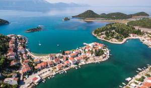 an aerial view of a small island in the water at Apartment More in Blace