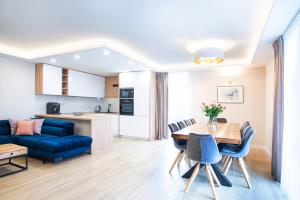 Kuchyňa alebo kuchynka v ubytovaní Harmonia Apartamenty Ustroń