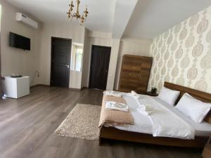 Voodi või voodid majutusasutuse Borjomi Central toas