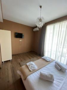 Voodi või voodid majutusasutuse Borjomi Central toas
