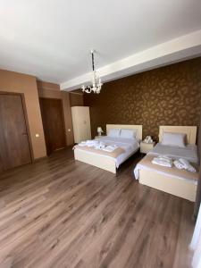 Voodi või voodid majutusasutuse Borjomi Central toas
