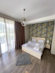 Postel nebo postele na pokoji v ubytování Borjomi Central
