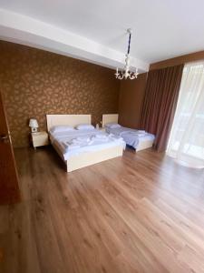 Voodi või voodid majutusasutuse Borjomi Central toas