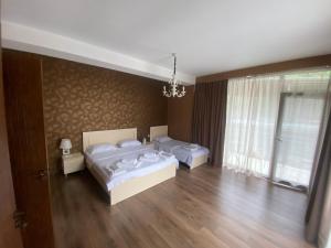 Voodi või voodid majutusasutuse Borjomi Central toas