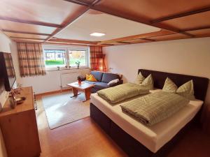 Ένα ή περισσότερα κρεβάτια σε δωμάτιο στο Glockenstuhl, Haus