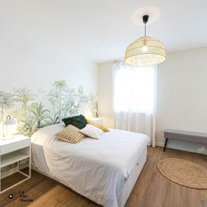 Säng eller sängar i ett rum på La Villa l'Escale, somptueuse maison contemporaine
