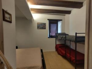 Ένα ή περισσότερα κρεβάτια σε δωμάτιο στο casa vacanze La Quiete