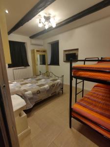 Katil dua tingkat atau katil-katil dua tingkat dalam bilik di casa vacanze La Quiete