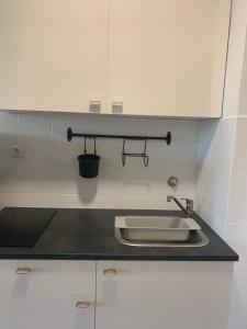Kuchyňa alebo kuchynka v ubytovaní Apartments Villa Ohana