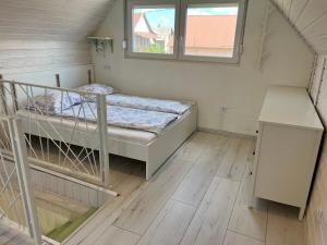 Postel nebo postele na pokoji v ubytování Helló Zsóry Apartman