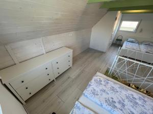 Postel nebo postele na pokoji v ubytování Helló Zsóry Apartman