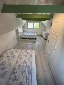 Postel nebo postele na pokoji v ubytování Helló Zsóry Apartman