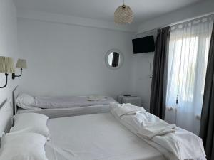 Postel nebo postele na pokoji v ubytování Turquoise