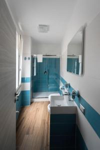 a bathroom with a sink and a shower at Dimora Francesca in Salerno