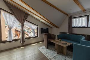 TV a/nebo společenská místnost v ubytování Verdi Rooms