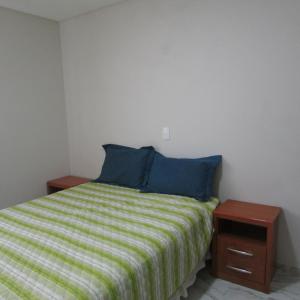 Cama o camas de una habitación en Apartamento em Balneario Camboriu