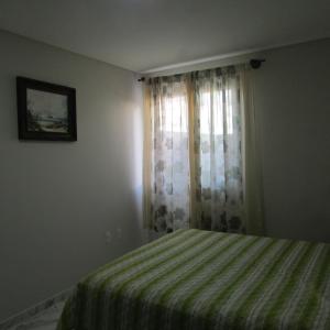 Cama o camas de una habitación en Apartamento em Balneario Camboriu