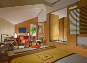 TV a/nebo společenská místnost v ubytování Bio Hotel Raphael - Relais & Châteaux