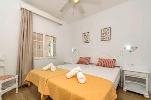 Posteľ alebo postele v izbe v ubytovaní Apartamento Castellsol 209