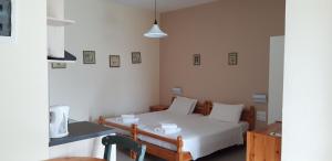 Postel nebo postele na pokoji v ubytování Crete Essence Villas - Makrygialos