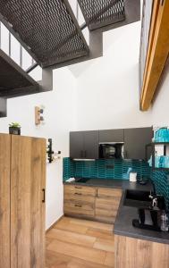 Kuchyň nebo kuchyňský kout v ubytování Sklep na Správném místě - degustace, ubytování a wellness
