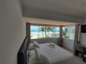 Cama ou camas em um quarto em Pousada Maria Bonita Porto De Galinhas