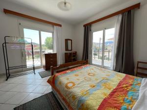 Ένα ή περισσότερα κρεβάτια σε δωμάτιο στο White Apartment - Thassos Town