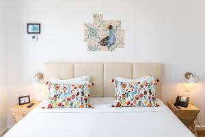 Hotel Cidade de Olhão客房内的一张或多张床位