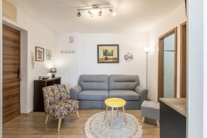Posedenie v ubytovaní Sunny City Apartment