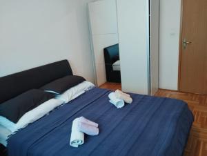 Posteľ alebo postele v izbe v ubytovaní Deep blue apartment