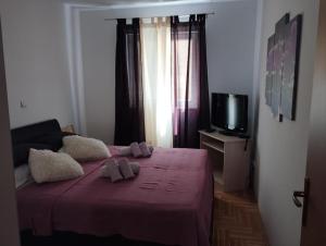 Posteľ alebo postele v izbe v ubytovaní Deep blue apartment