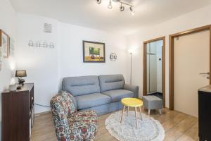 Posedenie v ubytovaní Sunny City Apartment