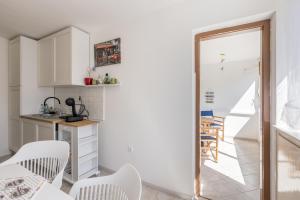 Kuchyňa alebo kuchynka v ubytovaní Sunny City Apartment