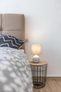 Posteľ alebo postele v izbe v ubytovaní Sunny City Apartment
