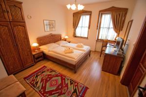 Postel nebo postele na pokoji v ubytování Boutique Hotel Old Town Mostar