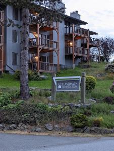a sign in front of a large building at The Landmark Inn on Orcas Island in Eastsound
