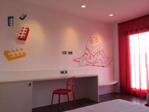Postel nebo postele na pokoji v ubytování Hotel Acuazul