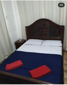 A bed or beds in a room at Pousada 4 cantos