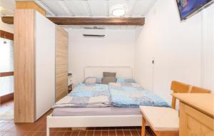 Postel nebo postele na pokoji v ubytování Ferienhaus Heiligenbrunn