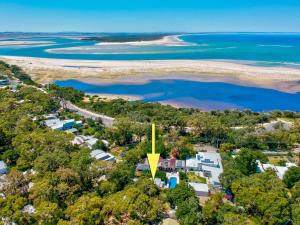 an aerial view of the shoreline of a beach at Sunset Beach Shack on Surf in Inverloch