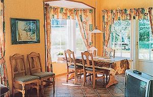 a dining room with a table and chairs and a window at Awesome Home In Lysvik With 1 Bedrooms in Lysvik